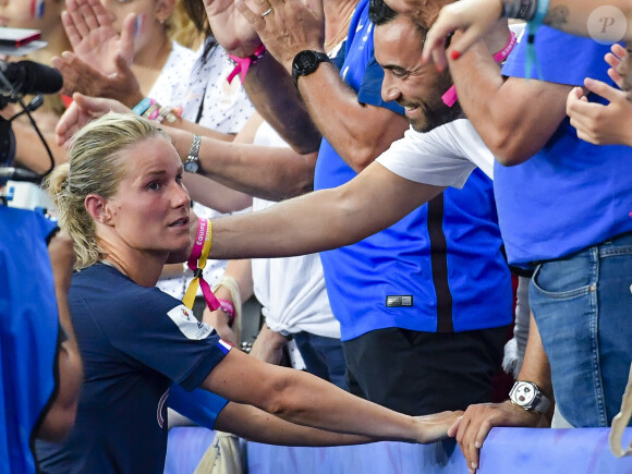 Amandine Henry et son compagnon Karim Kessaci dans les tribunes lors du quart de finale de la Coupe du Monde Féminine de football opposant les Etats-Unis à la France au Parc des Princes à Paris, France, le 28 juin 2019. Les USA ont gagné 2-1. © Pierre Perusseau/Bestimage  2019 Women's World Cup quarter-final football match between France and United States, at the Parc des Princes stadium in Paris, France, on June 28, 2019. USA won 2-1.