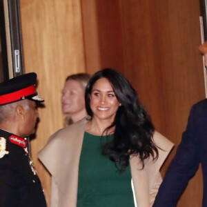 Le prince Harry, duc de Sussex, et Meghan Markle, duchesse de Sussex, quittent la cérémonie "Wellchild Awards" à Londres, le 15 octobre 2019. 