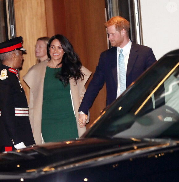 Le prince Harry, duc de Sussex, et Meghan Markle, duchesse de Sussex, quittent la cérémonie "Wellchild Awards" à Londres, le 15 octobre 2019. 