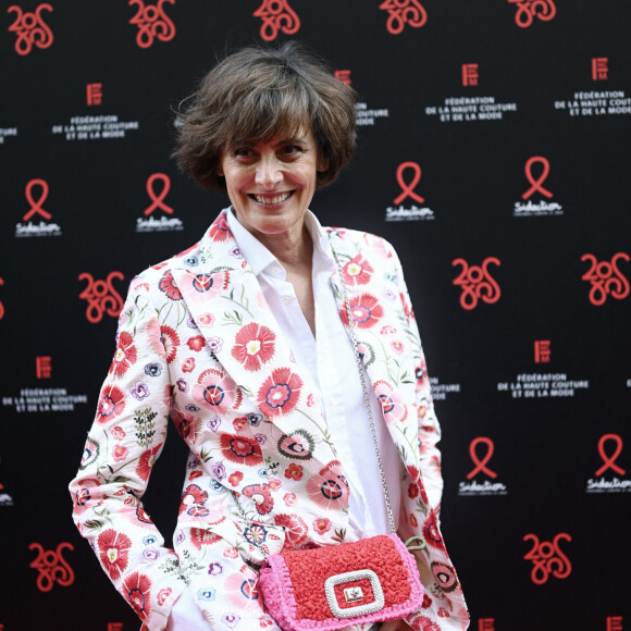 Une relation conflictuelle, qui est aujourd'hui très apaisée
Inès de la Fressange - Photocall de la 20ème édition du dîner de la Mode du Sidaction, "Annees Palace" au Pavillon Cambon Capucines à Paris le 6 juillet 2023. Ce dîner signe la clôture des défilés de la Semaine de la Haute Couture à Paris. . © Rachid Bellak/Bestimage 