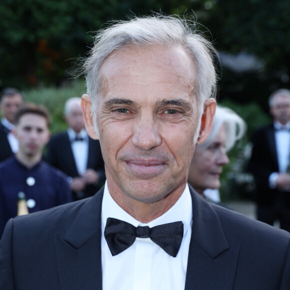 Un journaliste avait en effet expliqué que Jean-Paul Belmondo n'avait pas demandé que la musique du Professionnel soit diffusée à ses obsèques.
Paul Belmondo - Les célébrités fêtent le centenaire des 24 Heures du Mans au musée Rodin à Paris, le 16 mai 2023. © Rachid Bellak / Bestimage 