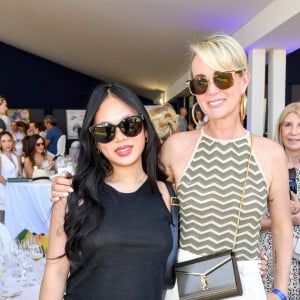 Exclusif - Laeticia Hallyday et sa fille Joy dans l'Espace VIP lors de la 9ème édition du "Longines Paris Eiffel Jumping" au Champ de Mars à Paris, France, le 25 juin 2023. © Perusseau-Veeren/Bestimage 