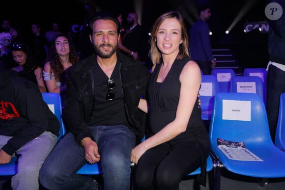 Maxim Nucci (Yodelice) et sa compagne enceinte Isabelle Ithurburu assistent au match de boxe de Tony Yoka au palais des sports de Paris, le 23 juin 2018 © Veeren-CVS/Bestimage