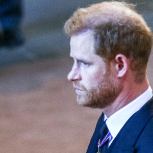 Seul son mari, le prince Harry, a été vu dans les tribunes
 
Le prince Harry et Meghan Markle - Procession cérémonielle du cercueil de la reine Elisabeth II du palais de Buckingham à Westminster Hall à Londres le 14 septembre 2022. © Photoshot / Panoramic / Bestimage