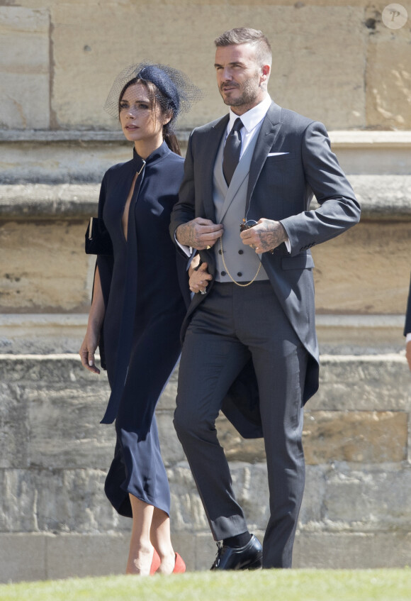David Beckham et sa femme Victoria - Les invités à la sortie de la chapelle St. George au château de Windsor, Royaume Uni, le 19 mai 2018. 