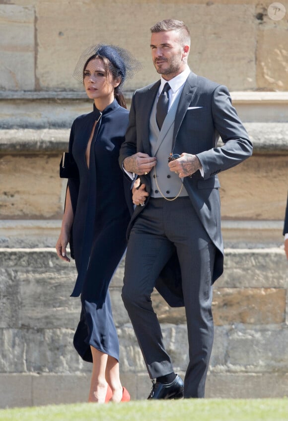 David Beckham et sa femme Victoria - Les invités à la sortie de la chapelle St. George au château de Windsor, Royaume Uni, le 19 mai 2018. 