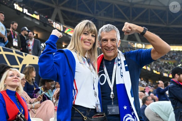 Nagui et sa femme Mélanie Page dans les tribunes du match "France - Argentine en finale de la Coupe du Monde 2022 au Qatar, le 18 décembre 2022. © Philippe Perusseau / Bestimage 