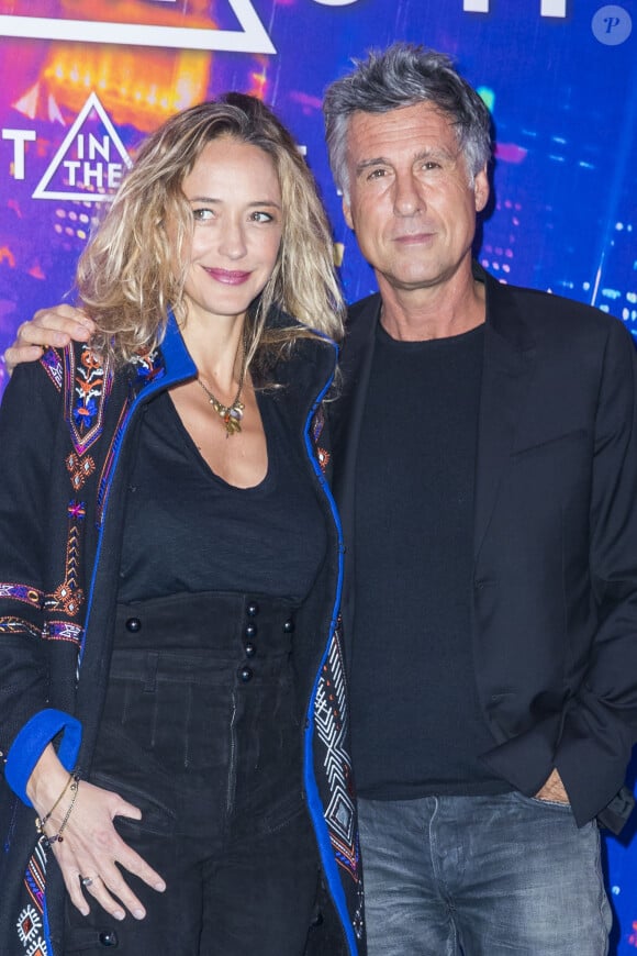 Hélène de Fougerolles et son compagnon Marc Simoncini - Avant-première du film "Ghost in the Shell" au Grand Rex à Paris, le 21 mars 2017.