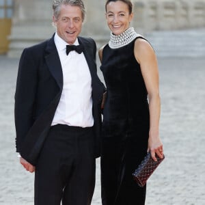 Hugh Grant et sa femme Anna Elisabet Eberstein - Dîner d'Etat au château de Versailles en l'honneur de la visite officielle du roi et de la reine d'Angleterre en France (20 - 22 septembre 2023), le 20 septembre 2023. 150 invités triés sur le volet ont été conviés à cette occasion. © Jacovides-Moreau / Bestimage 