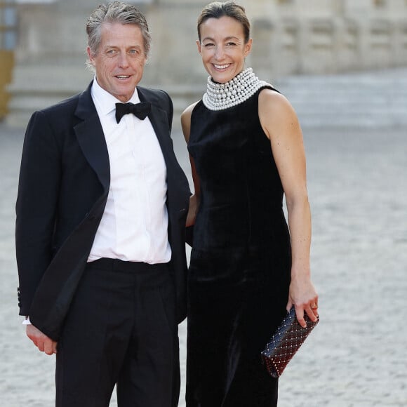 Hugh Grant et sa femme Anna Elisabet Eberstein - Dîner d'Etat au château de Versailles en l'honneur de la visite officielle du roi et de la reine d'Angleterre en France (20 - 22 septembre 2023), le 20 septembre 2023. 150 invités triés sur le volet ont été conviés à cette occasion. © Jacovides-Moreau / Bestimage 