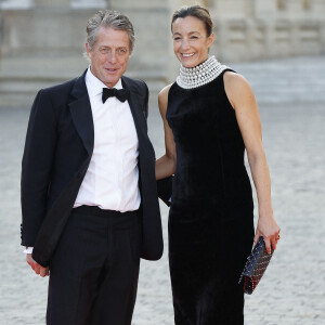 Hugh Grant et sa femme Anna Elisabet Eberstein - Dîner d'Etat au château de Versailles en l'honneur de la visite officielle du roi et de la reine d'Angleterre en France (20 - 22 septembre 2023), le 20 septembre 2023. 150 invités triés sur le volet ont été conviés à cette occasion. © Jacovides-Moreau / Bestimage 