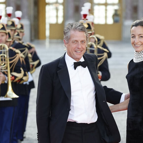 Hugh Grant et sa femme Anna Elisabet Eberstein - Dîner d'Etat au château de Versailles en l'honneur de la visite officielle du roi et de la reine d'Angleterre en France (20 - 22 septembre 2023), le 20 septembre 2023. 150 invités triés sur le volet ont été conviés à cette occasion. © Jacovides-Moreau / Bestimage 