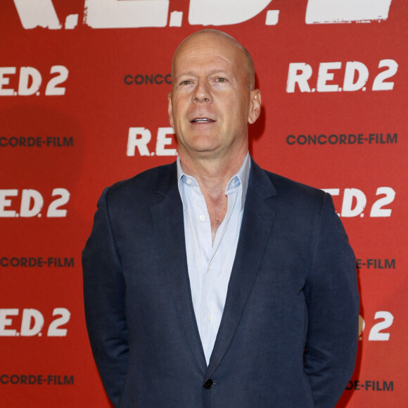Des révélations faites cette semaine par le réalisateur Glenn Gordon Caron.
Bruce Willis lors du photocall du film "Red 2" a l'hotel Mandarin Oriental a Munich. Le 24 juillet 2013 