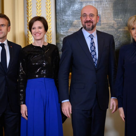 Emmanuel Macron, président de la République et sa femme Brigitte avec Charles Michel, President du Conseil europeen et son épouse Amélie Derbaudrenghien Michel, lors du dîner des chefs d'état à l'occasion du 6eme Forum de Paris sur la paix le 9 novembre 2023. © Eric Tschaen / Pool / Bestimage