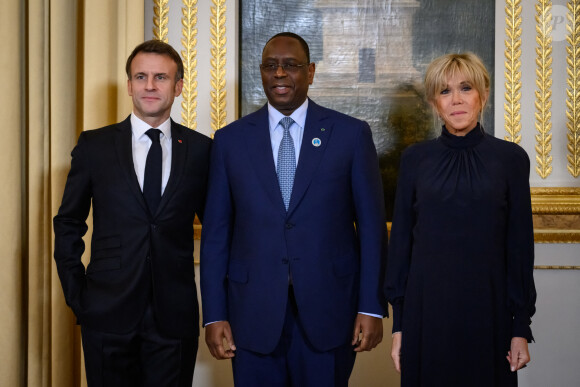 Emmanuel Macron, président de la Republique et sa femme Brigitte avec Macky Sall, Président du Sénégal, lors du dîner des chefs d'état à l'occasion du 6eme Forum de Paris sur la paix le 9 novembre 2023. © Eric Tschaen / Pool / Bestimage