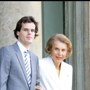 Lilianne Bettencourt - Giorgio Armani & Claudia Cardinale reçoivent la Légion d'Honneur au Palais de l'Elysée. 