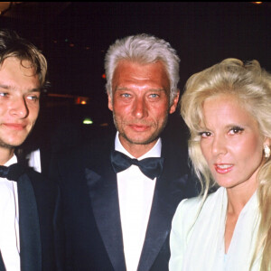 David Hallyday y évoque son enfance difficile
Archives- David Hallyday, Johnny Hallyday et Sylvie Vartan au Festival de Cannes en 1986.