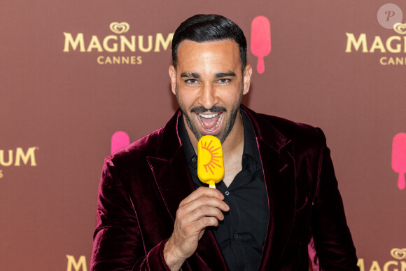 "J'ai failli, ouais. J'étais content, j'allais le faire. On m'a contacté", a déclaré Adil Rami
 
Adil Rami - Soirée sur la plage Magnum lors du 76ème Festival International du Film de Cannes le 22 mai 2023. © Cannes Magnum/Jeremy Melloul/Bestimage