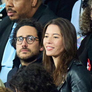 Thomas Hollande et sa femme Emilie Broussouloux - People des les tribunes de la coupe du Monde de Rugby France 2023 - Match de quart de finale "France-Afrique du Sud (28-29)" au Stade de France à Saint-Denis 15 octobre 2023. © Moreau-Jacovides/Bestimage