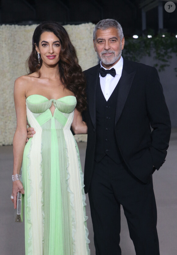 Amal Clooney et son mari George Clooney - Photocall de la 2ème édition du gala annuel du musée de l'Académie à l'Academy Museum of Motion Pictures de Los Angeles, Californie, Etats-Unis, le 15 octobre 2022. 