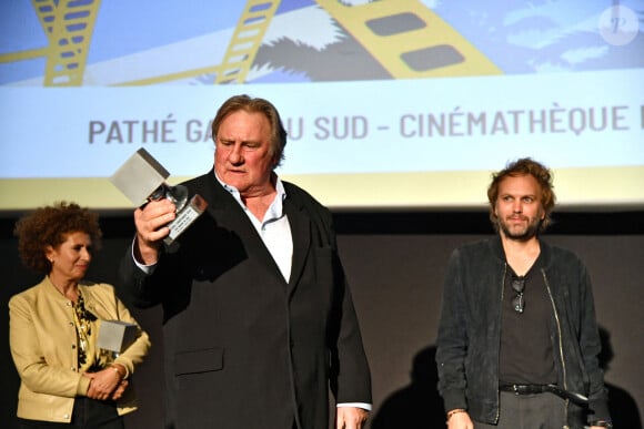 Guilaine Londez, Gérard Depardieu et Florian Zeller lors de la soirée de clôture de la 3eme édition du Festival Cinéroman à Nice, le 24 octobre 2021. © Bruno Bebert / Bestimage 
