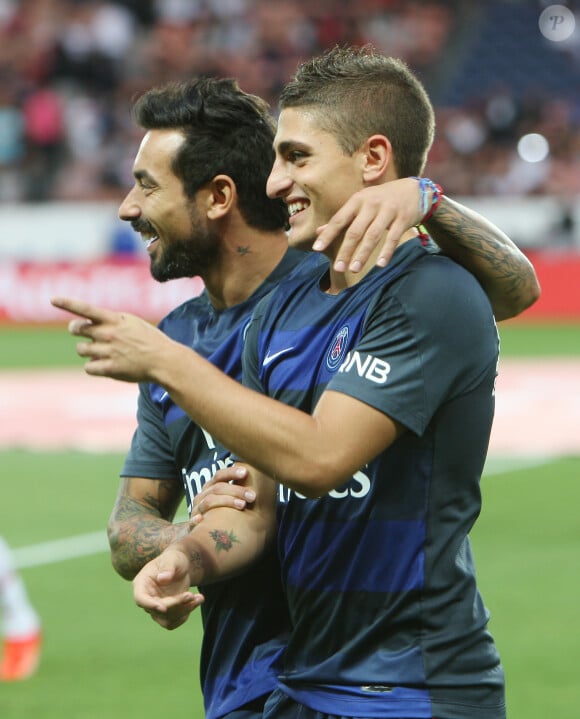 Ezequiel Lavezzi et Marco Verratti - Match comptant pour la 2eme journee du championnat de France de football entre le PSG et AC Ajaccio (1-1) au Parc des Princes. Paris le 18 Aout 2013.