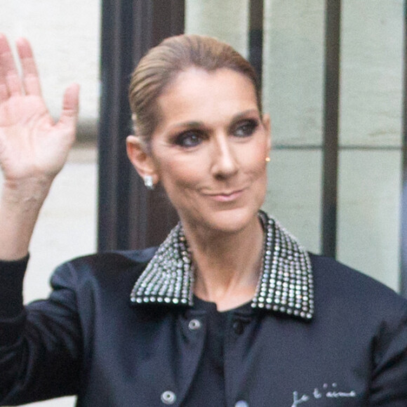 Céline Dion et son fils René-Charles Angelil sortent de l'hôtel Royal Monceau à Paris.