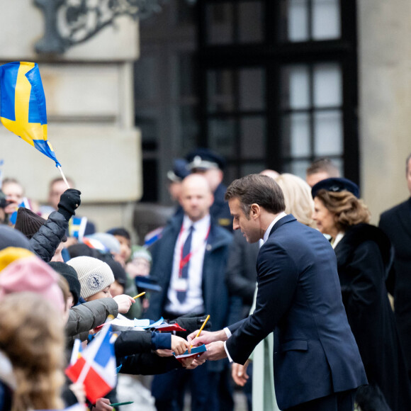 Le roi et la reine de Suède accueillent le président Emmanuel Macron et sa femme la Première Dame femme dans la cour intérieure du palais royal de Stockholm, Suède, le 30 janvier 2024. © Dana Press/Bestimage 