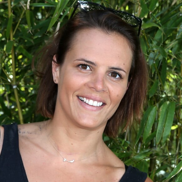 Laure Manaudou - People dans le village lors de la finale du tournoi de tennis de Roland-Garros à Paris, le 7 juin 2015.