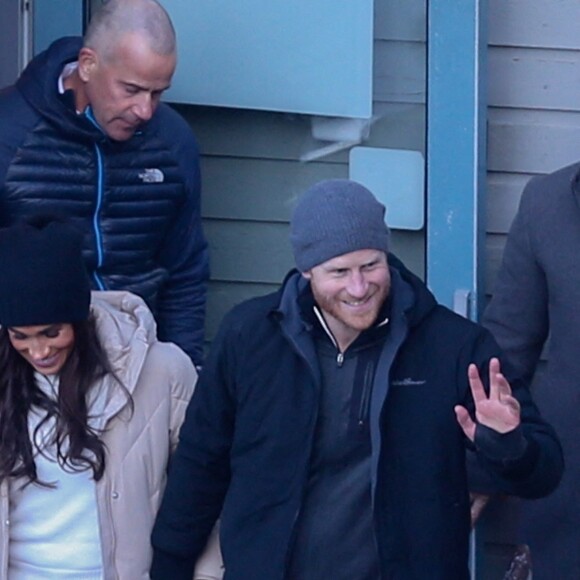 Le prince Harry, duc de Sussex et Meghan Markle, duchesse de Sussex, en visite au camp d'entrainement des athlètes des Invictus Games 2024 à Whistler en Colombie Britannique, le 14 février 2024. 