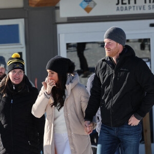 Le prince Harry, duc de Sussex et Meghan Markle, duchesse de Sussex, en visite au camp d'entrainement des athlètes des Invictus Games 2024 à Whistler en Colombie Britannique, le 14 février 2024. 