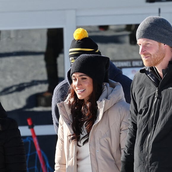 Le prince Harry, duc de Sussex et Meghan Markle, duchesse de Sussex, en visite au camp d'entrainement des athlètes des Invictus Games 2024 à Whistler en Colombie Britannique, le 14 février 2024. 