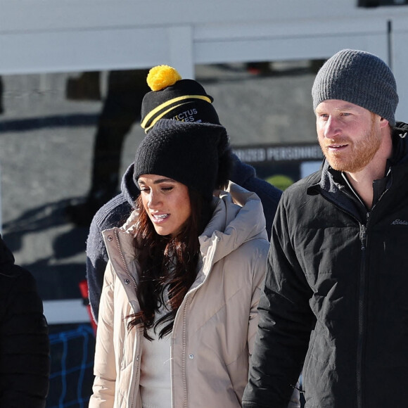 Le prince Harry, duc de Sussex et Meghan Markle, duchesse de Sussex, en visite au camp d'entrainement des athlètes des Invictus Games 2024 à Whistler en Colombie Britannique, le 14 février 2024. 