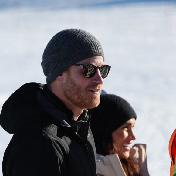 Le prince Harry, duc de Sussex et Meghan Markle, duchesse de Sussex, en visite au camp d'entrainement des athlètes des Invictus Games 2024 à Whistler en Colombie Britannique, le 14 février 2024. 