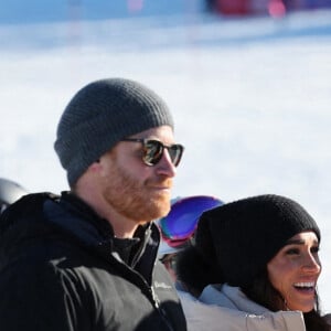 Le prince Harry, duc de Sussex et Meghan Markle, duchesse de Sussex, en visite au camp d'entrainement des athlètes des Invictus Games 2024 à Whistler en Colombie Britannique, le 14 février 2024. 