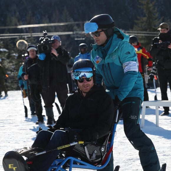 Le prince Harry, duc de Sussex et Meghan Markle, duchesse de Sussex, en visite au camp d'entrainement des athlètes des Invictus Games 2024 à Whistler en Colombie Britannique, le 14 février 2024. 