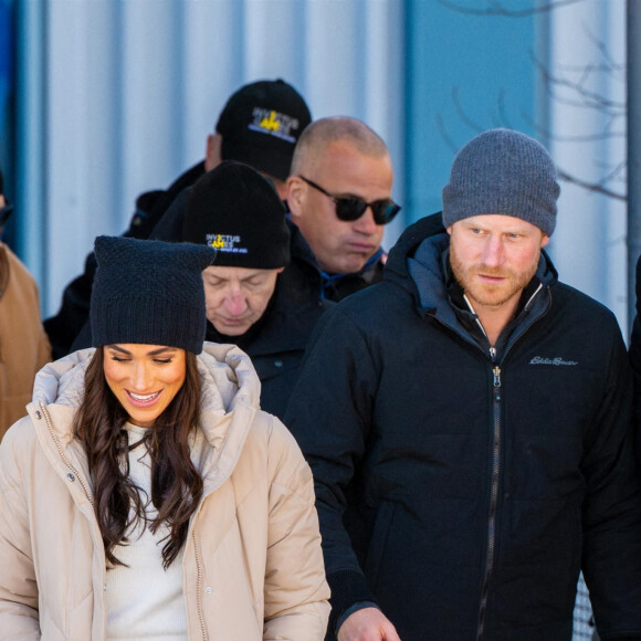 Le prince Harry, duc de Sussex et Meghan Markle, duchesse de Sussex, en visite au camp d'entrainement des athlètes des Invictus Games 2024 à Whistler en Colombie Britannique, le 14 février 2024. 