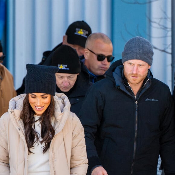 Le prince Harry, duc de Sussex et Meghan Markle, duchesse de Sussex, en visite au camp d'entrainement des athlètes des Invictus Games 2024 à Whistler en Colombie Britannique, le 14 février 2024. 