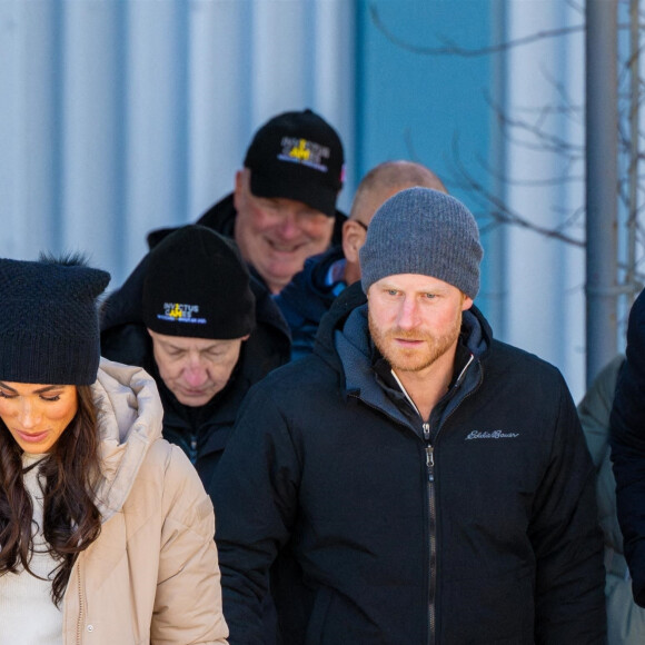 Le prince Harry, duc de Sussex et Meghan Markle, duchesse de Sussex, en visite au camp d'entrainement des athlètes des Invictus Games 2024 à Whistler en Colombie Britannique, le 14 février 2024. 