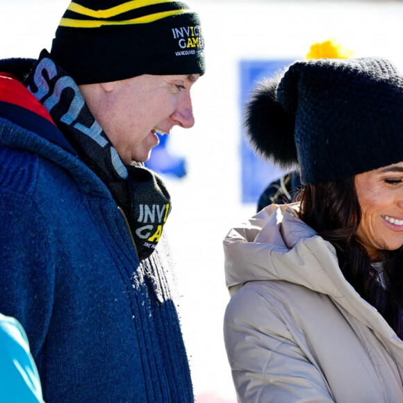 Le prince Harry, duc de Sussex et Meghan Markle, duchesse de Sussex, en visite au camp d'entrainement des athlètes des Invictus Games 2024 à Whistler en Colombie Britannique, le 14 février 2024. 