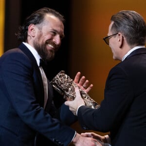 Vainqueur du César du meilleur acteur les deux années précédentes, Benoît Magimel a remis le trophée à son successeur

Arieh Worthalter (César du meilleur acteur pour " Le Procès Goldman ") et Benoît Magimel - 49ème édition de la cérémonie des César à l'Olympia à Paris le 23 février 2024 © Dominique Jacovides / Olivier Borde / Bestimage