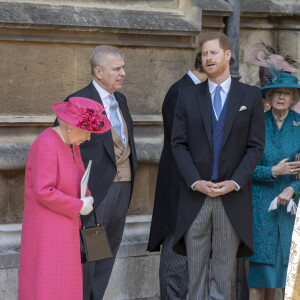 Dont la reine Elizabeth II et le prince Philip dont elle était très proche. 
La reine Elisabeth II d'Angleterre, le prince Andrew, le prince Harry - Mariage de Lady Gabriella Windsor avec Thomas Kingston dans la chapelle Saint-Georges du château de Windsor le 18 mai 2019. 