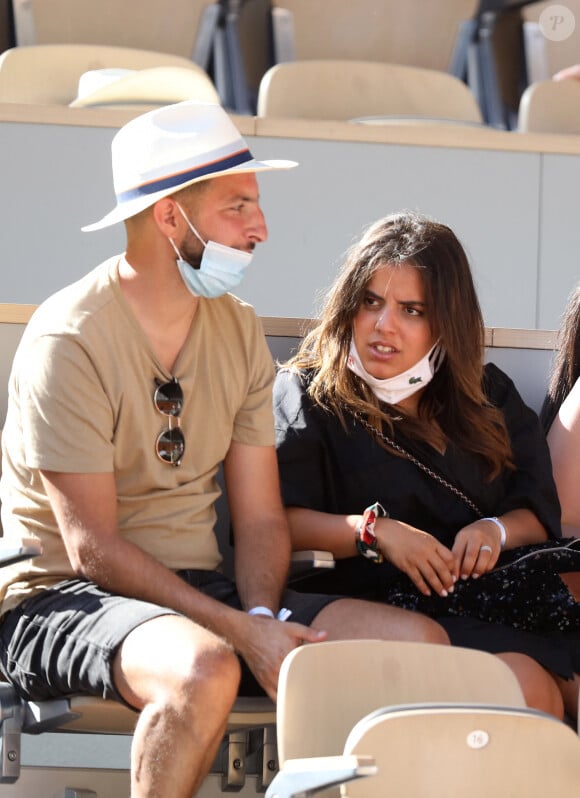 Inés Reg et guest dans les tribunes des Internationaux de France de Roland Garros à Paris le 11 juin 2021. © Dominique Jacovides / Bestimage 