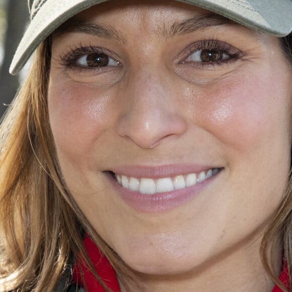 Laury Thilleman participe à une collecte de déchets autour du Bassin de la Villette organisée par l'association Surfrider à Paris, France le 23 mars 2022. Photo par Aurore Marechal/ABACAPRESS.COM