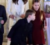 Puis de cette photo où on le voit souffler le cierge de sa soeur pendant le concert de Noël.
La princesse Charlotte de Galles et le prince Louis de Galles, à la sortie du traditionnel concert de Noël "Together At Christmas" à l'abbaye de Westminster à Londres, Royaume Uni, le 8 décembre 2023. 