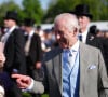 Un évènement qui a mis Charles III en joie
Le roi Charles III d'Angleterre et Camilla Parker Bowles, reine consort d'Angleterre, reçoivent des invités lors d'une Garden Party à Buckingham Palace à Londres, le 8 mai 2024. 