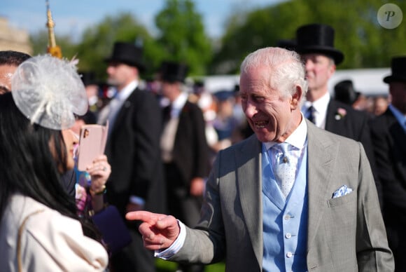 Un évènement qui a mis Charles III en joie
Le roi Charles III d'Angleterre et Camilla Parker Bowles, reine consort d'Angleterre, reçoivent des invités lors d'une Garden Party à Buckingham Palace à Londres, le 8 mai 2024. 