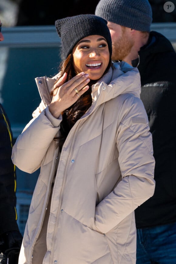 Le prince Harry, duc de Sussex et Meghan Markle, duchesse de Sussex, en visite au camp d'entrainement des athlètes des Invictus Games 2024 à Whistler en Colombie Britannique, le 14 février 2024. 