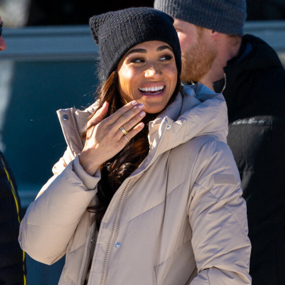 Le prince Harry, duc de Sussex et Meghan Markle, duchesse de Sussex, en visite au camp d'entrainement des athlètes des Invictus Games 2024 à Whistler en Colombie Britannique, le 14 février 2024. 