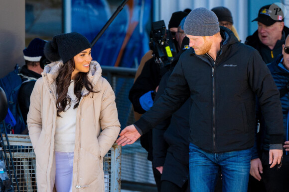 Le prince Harry, duc de Sussex et Meghan Markle, duchesse de Sussex, en visite au camp d'entrainement des athlètes des Invictus Games 2024 à Whistler en Colombie Britannique, le 14 février 2024. 